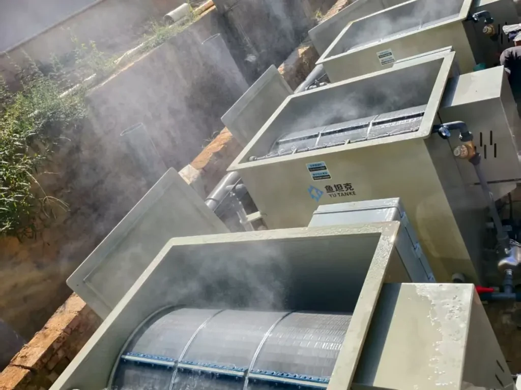 Open filtration units with visible spray above the filter screens.