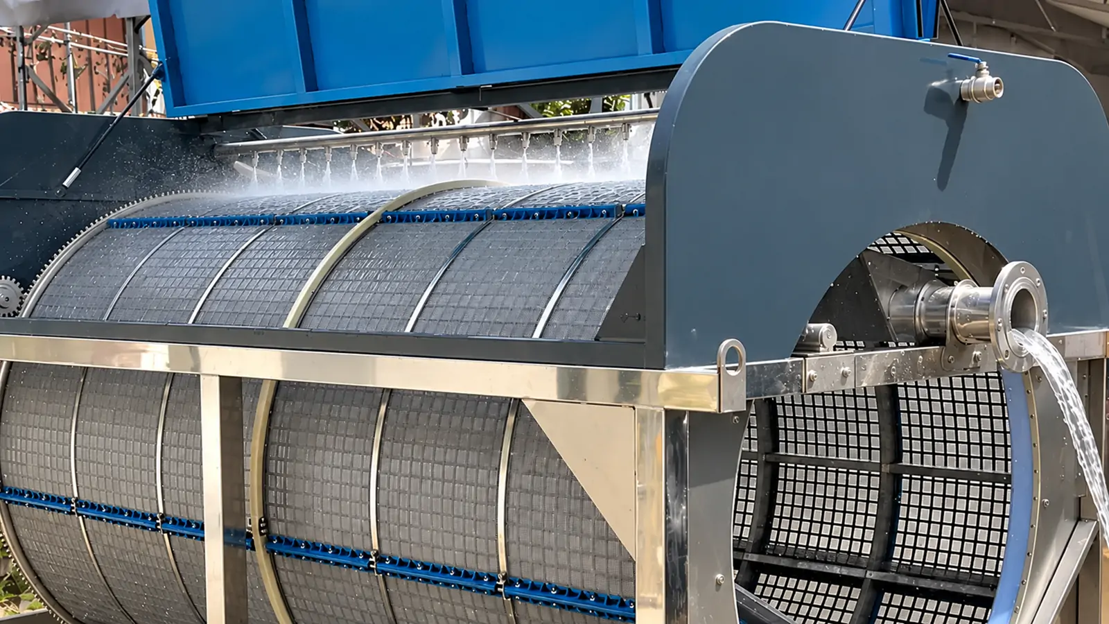 Solids removed by backwashing leave the recirculating system through the YUTANK drum filter's waste channel.